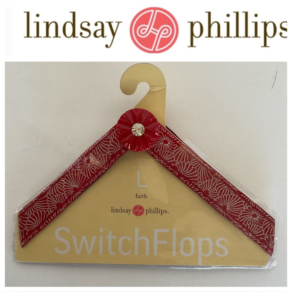 NWT Lindsay Phillips switch flops. Size large “faith”